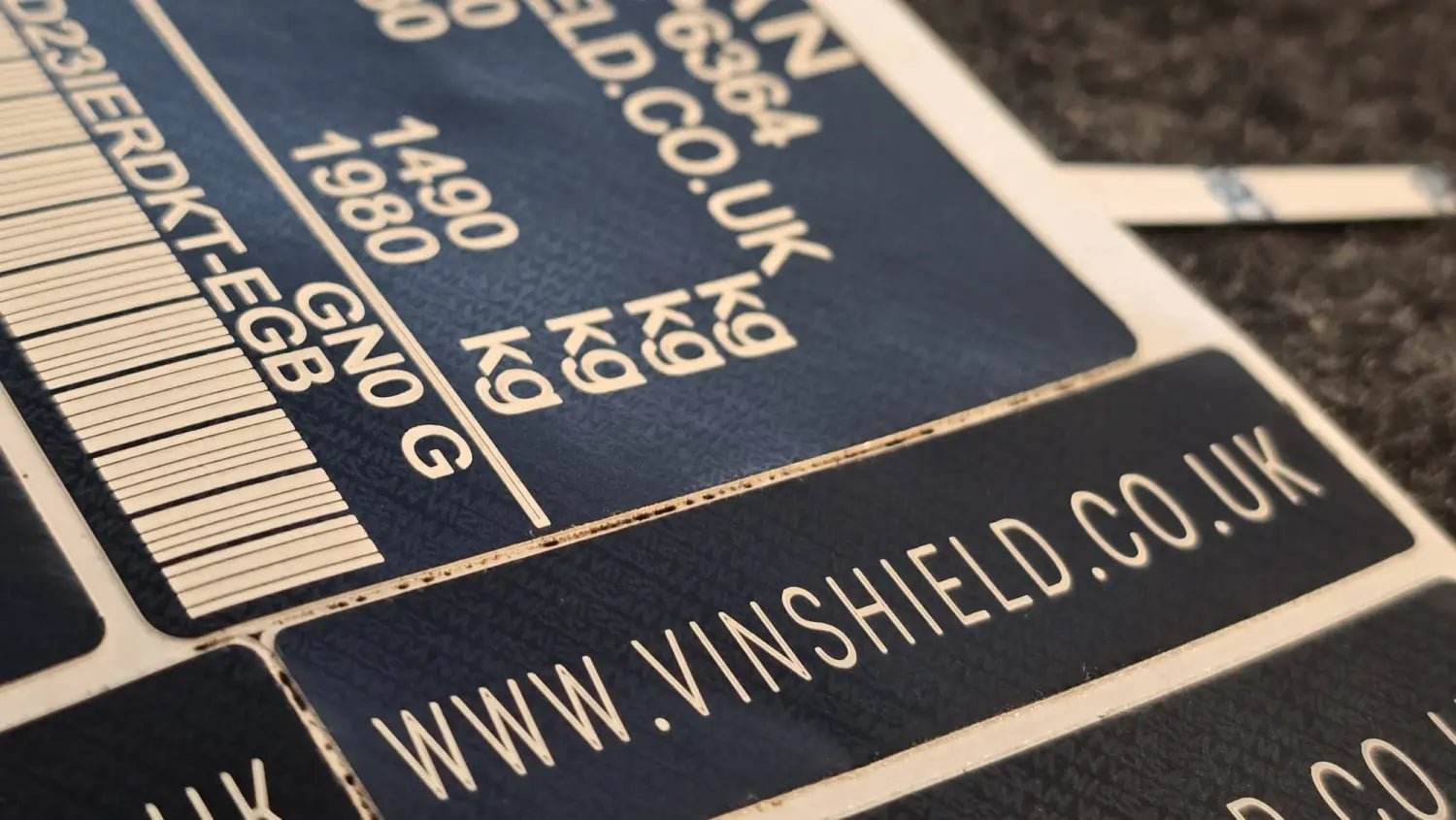 Nissan replacement VIN sticker with micro hologram security detail - VinShield UK example