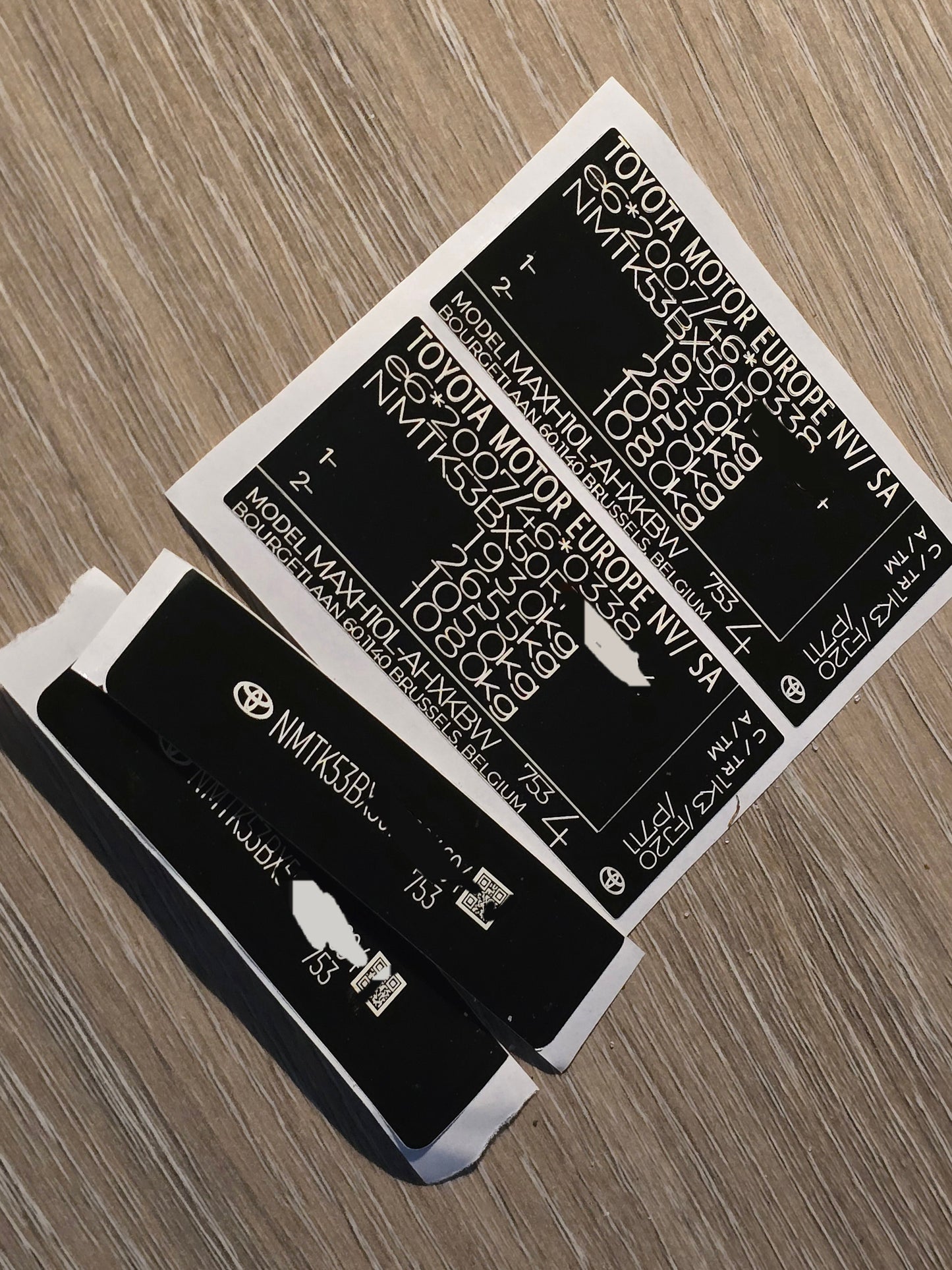 Order a complete Toyota VIN replacement set including a Toyota door / B-pillar VIN label, Toyota windscreen VIN sticker, and Toyota chassis VIN plate